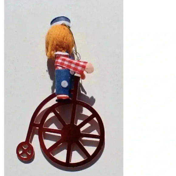 Vintage Raggedy Andy Riding A Unicycle Christmas Tree Ornament - Picture 2 of 2
